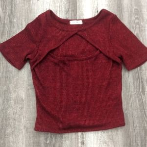 Cut out short sleeve knit cropped top. Juniors size L